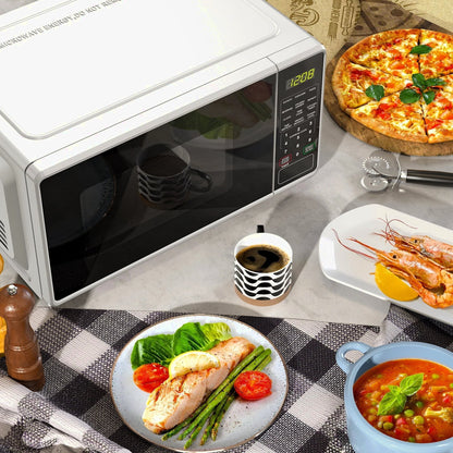 Mainstays Countertop Microwave Oven 0.7 Cu Ft 700 Watts White - MSF0W100072352